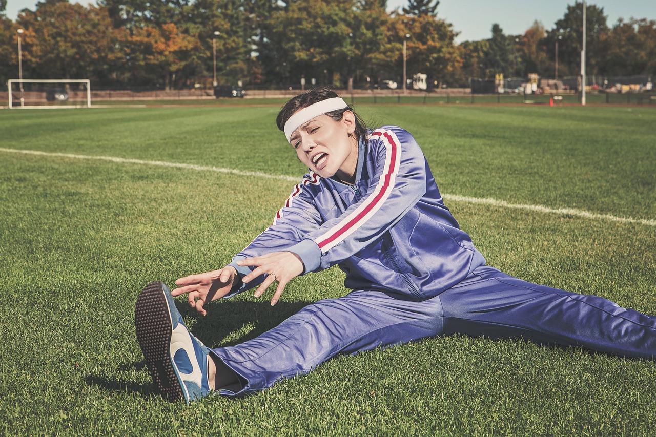 Stretching, sports, woman — Dental Issues Explained: Causes and Prevention